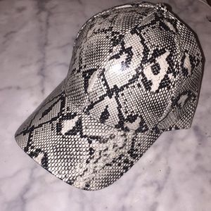 Women’s  faux-snakeskin “dad” hat